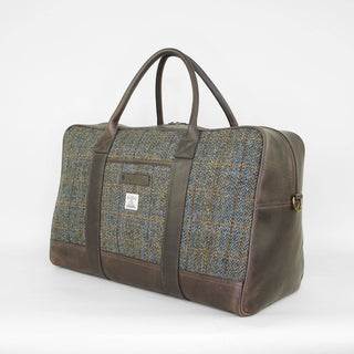 Braune Harris Tweed® Reisetasche aus Leder und Wolle, Vorderansicht.